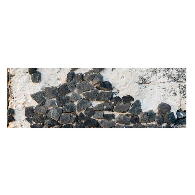 Tavlor modernt Wall With Black Stones