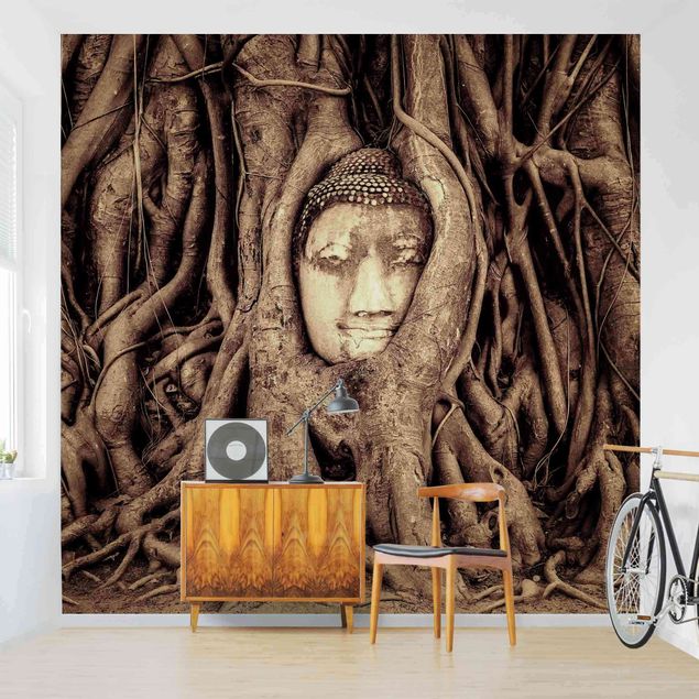 Fototapeter blommor  Buddha In Ayutthaya Lined From Tree Roots In Brown