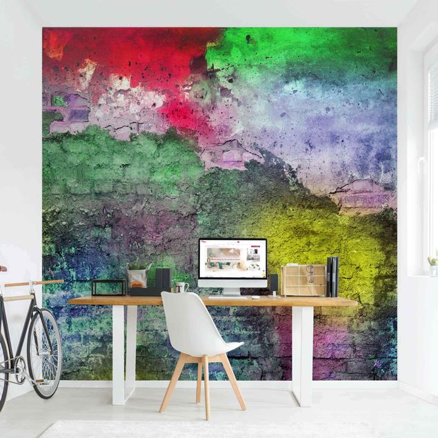 Fototapeter natursten Colourful Sprayed Old Brick Wall