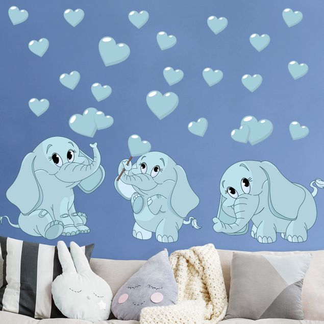 Inredning av barnrum Three blue elephant babies with hearts