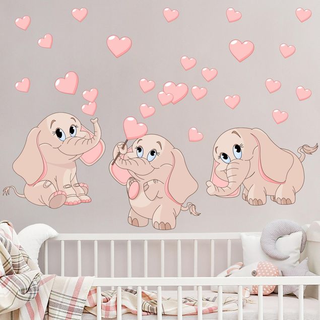 Inredning av barnrum Three pink elephant babies with hearts