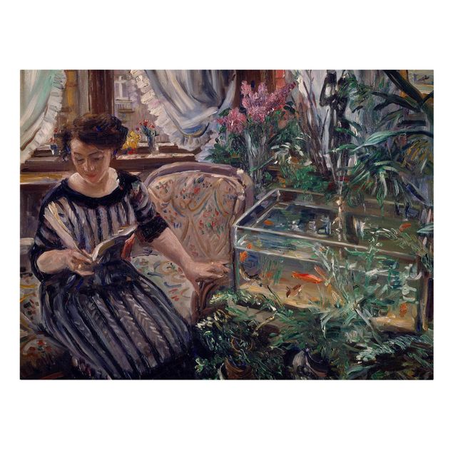Canvastavlor konstutskrifter Lovis Corinth - A Woman Reading Near A Goldfish Tank