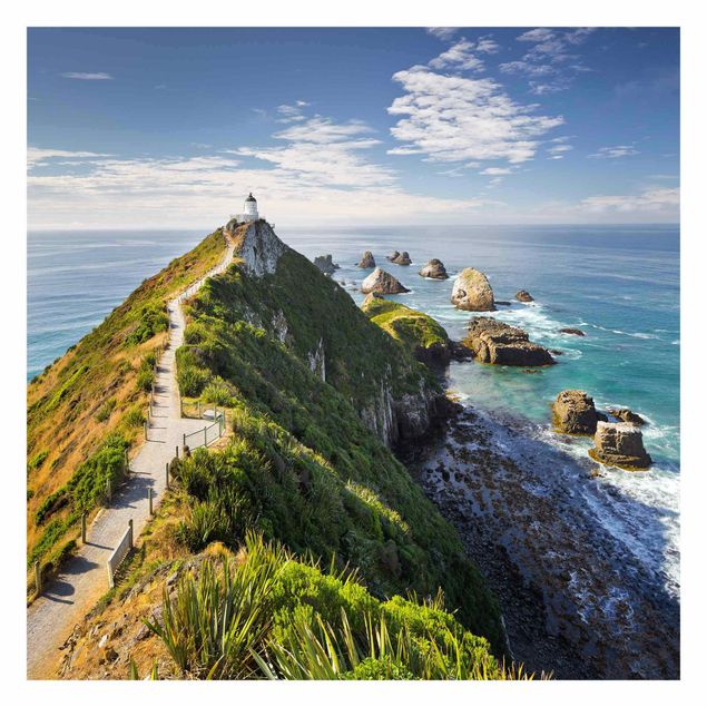 Fototapeter landskap Nugget Point Lighthouse And Sea New Zealand