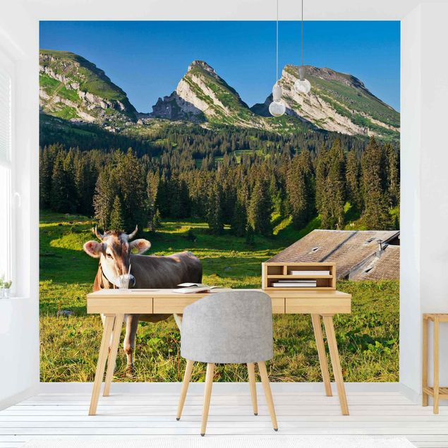 Fototapeter landskap Swiss Alpine Meadow With Cow