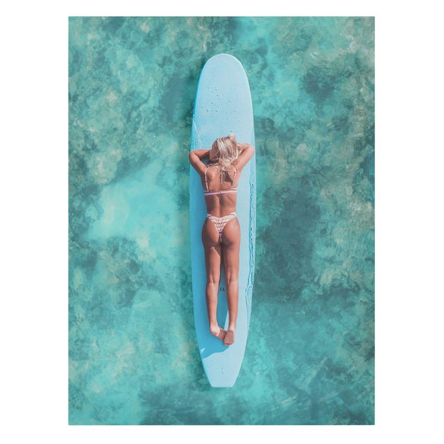 Canvastavlor stränder Surfer Girl With Blue Board