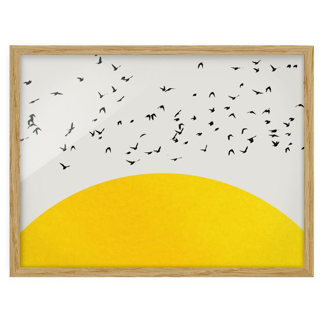 Tavlor med ram djur Flock Of Birds In Front Of Yellow Sun