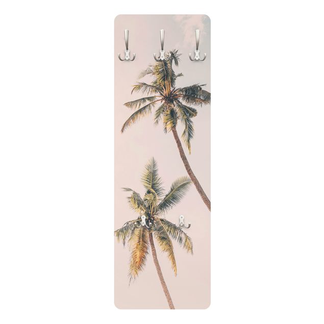 Klädhängare vägg Two palm trees against a pink sky